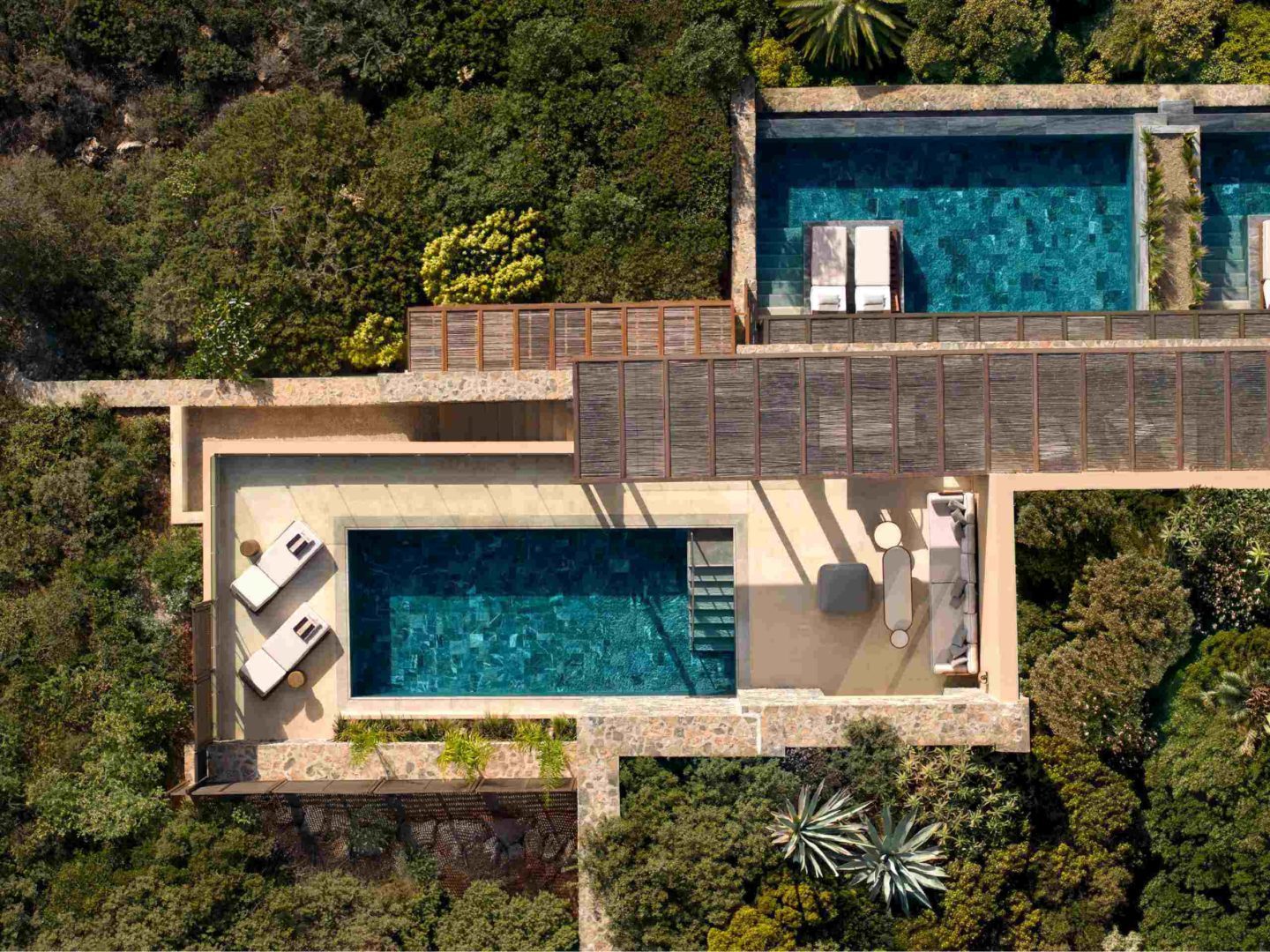 Bird's-eye view of the pool and bay at Daios Cove